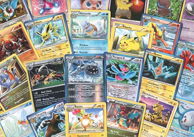 100 Assorted Pokemon Cards with 7 Bonus Foils